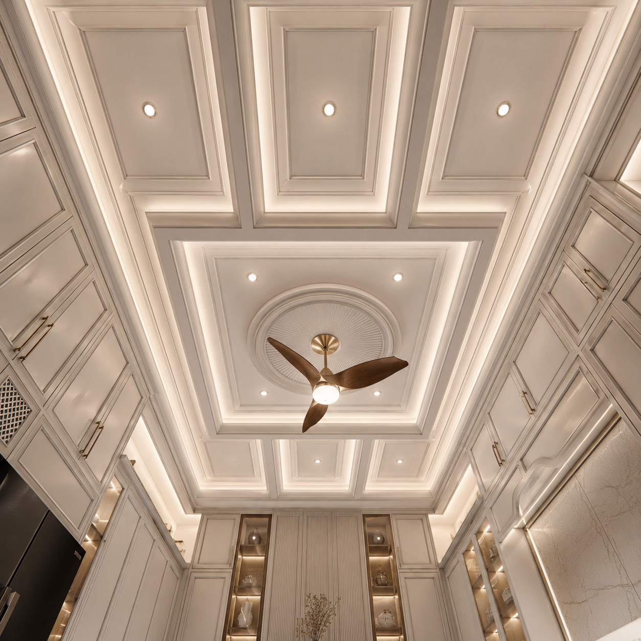 Luxury kitchen ceiling detail with recessed panels, soft lighting and ceiling fan